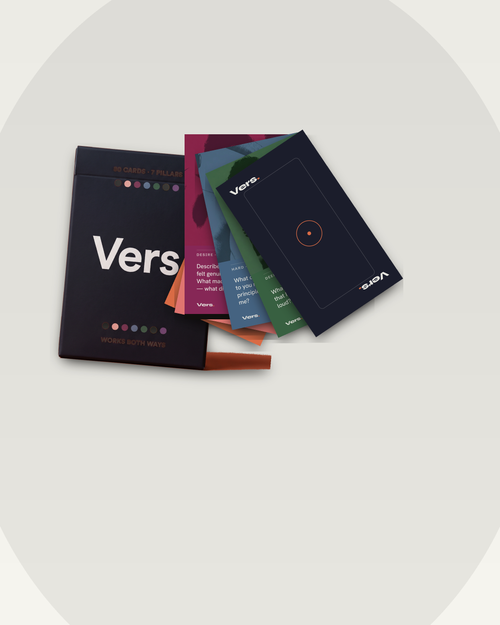 The Vers. deck with cards fanning out of the box